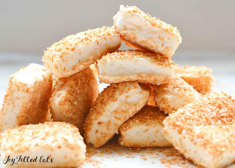 Pile of sugar free marshmallows all coated in toasted coconut
