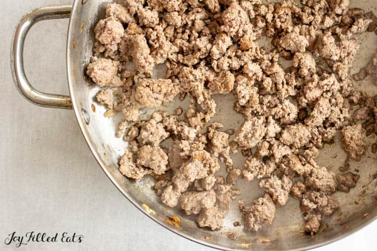 skillet filled with cooked ground beef