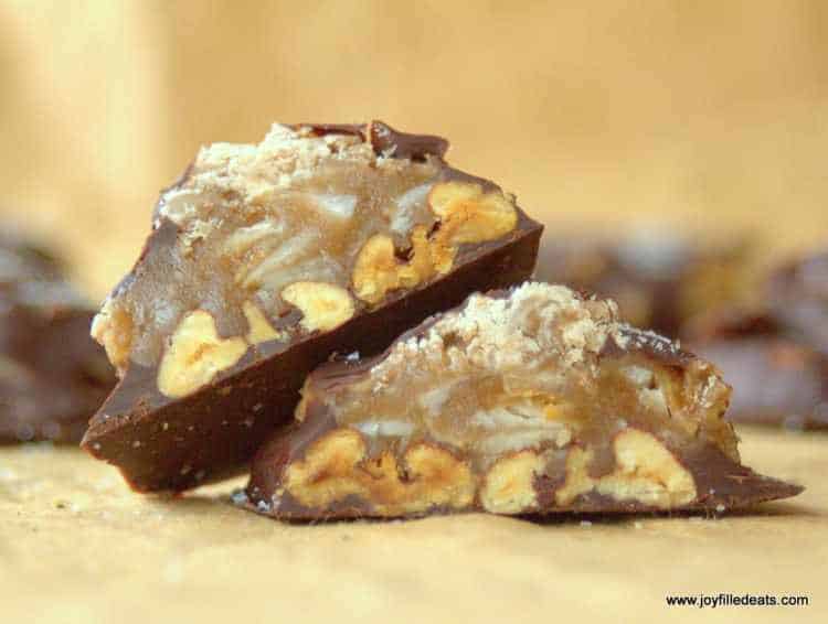 Close up of halved toasted coconut toffee pecan turtles