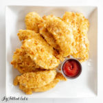 a square plate of chicken tenders