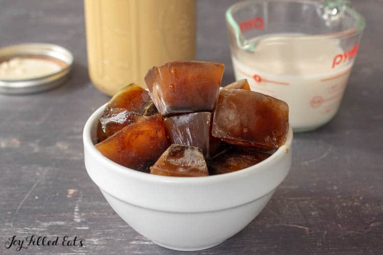 Small white bowl of coffee ice cubes