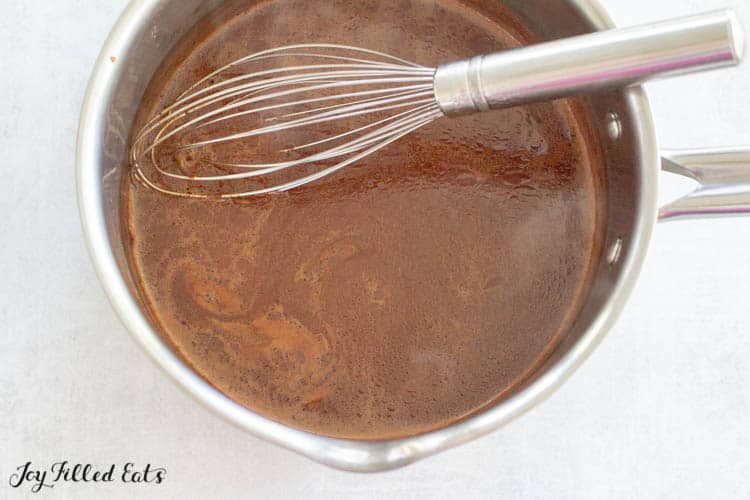 Keto mocha in sauce pan with whisk