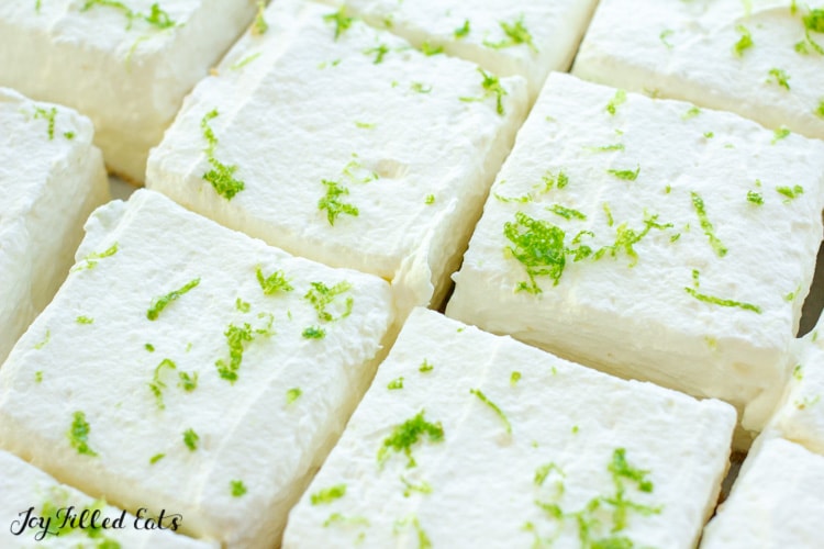 Lime Cheesecake Bars with whipped cream