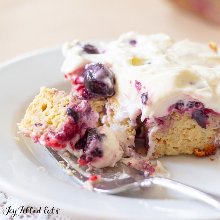 close up of Keto Berry Cake with a bite on a fork