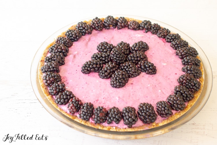 cheesecake topped with blackberries