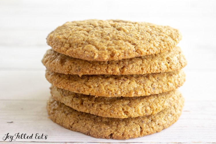 five almond flour peanut butter cookies stacked on top of each other