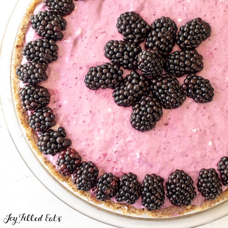 overhead shot of the Keto Blackberry Cheesecake in a glass pie plate