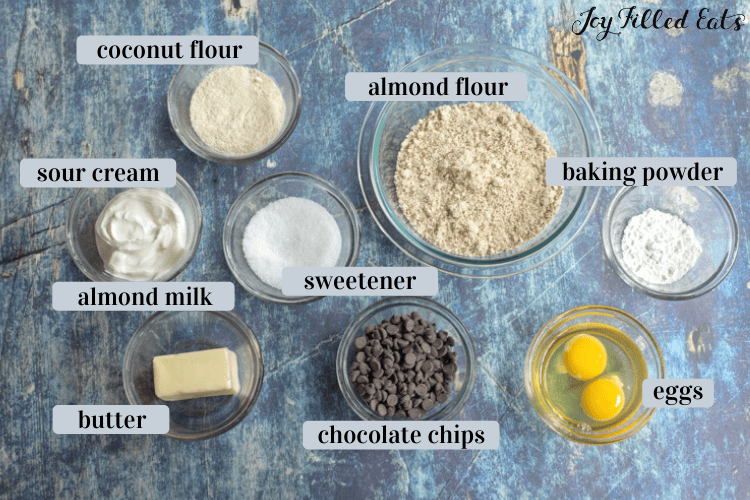 bowls of ingredients including almond flour, eggs, sour cream, butter, etc.