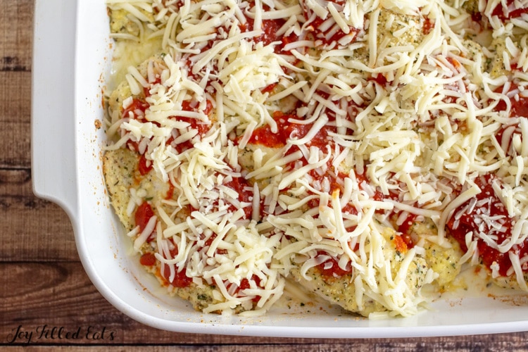 sauce and cheese in casserole dish