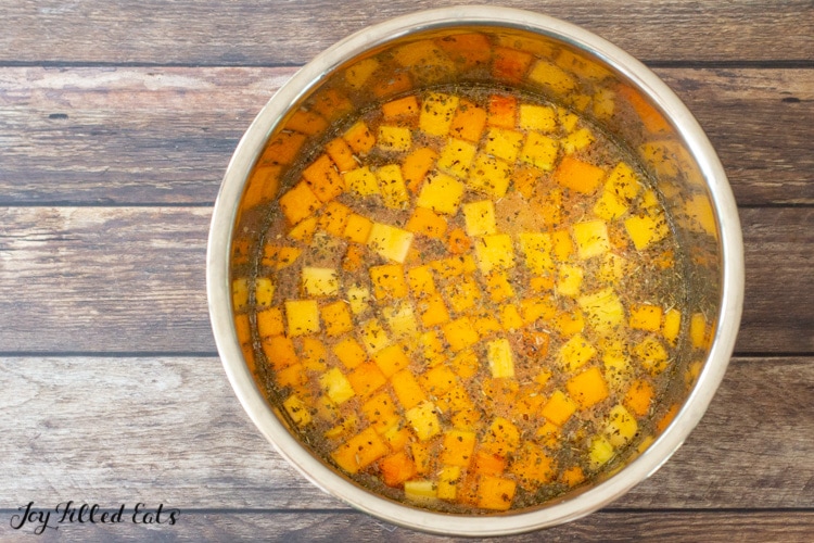 chopped squash in the instant pot bowl in broth