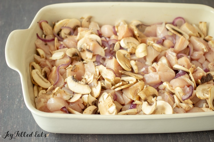 chicken mushrooms and onions in a large casserole dish