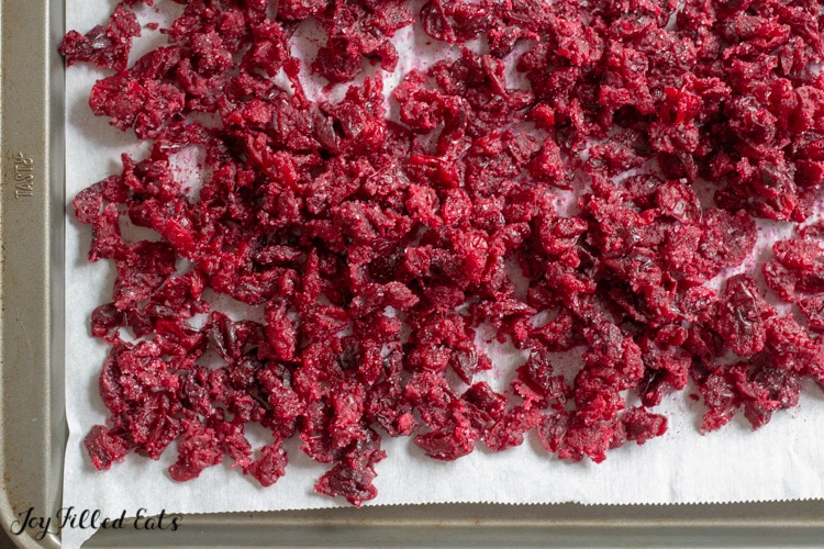sugar free dried cranberries on parchment paper
