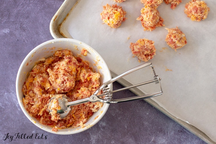 baking sheet with balls of sausage mix