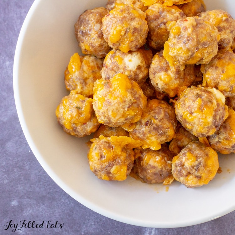 keto sausage balls in a white serving bowl