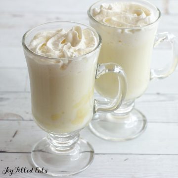 two mugs of white chocolate from the white hot cocoa mix