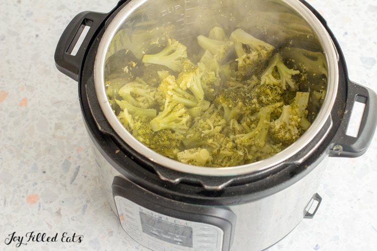 hot steamed broccoli in pressure cooker