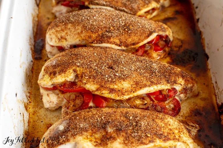 chicken breasts stuffed with peppers and onions and topped with fajita seasoning