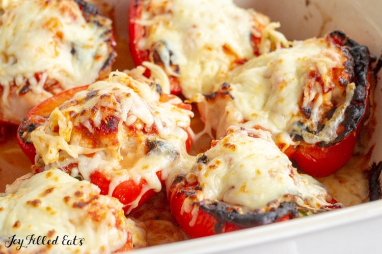 close up of the chicken parm stuffed peppers in a casserole dish