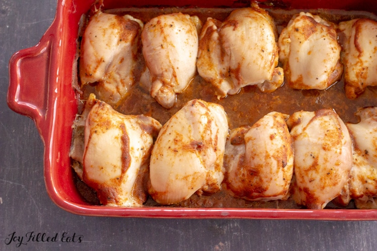 baked chicken thighs in a casserole dish