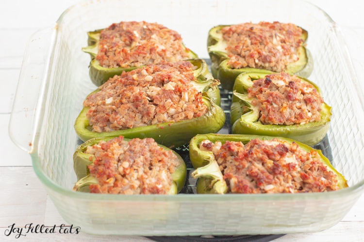 halved green peppers stuffed with beef and cauliflower
