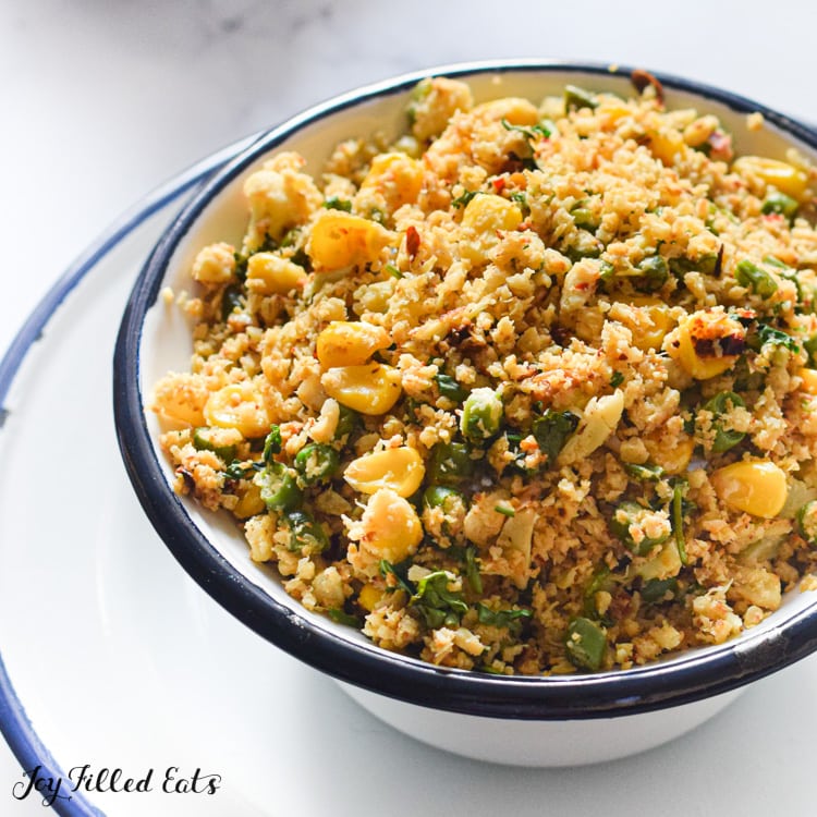 close up of a bowl of mediterranean cauliflower rice