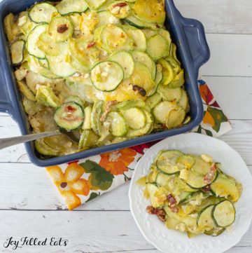 overhead shot of zucchini casserole with a serving on a plate