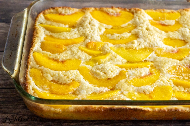 side shot of the keto peach cobbler baked in a 9x13 glass dish