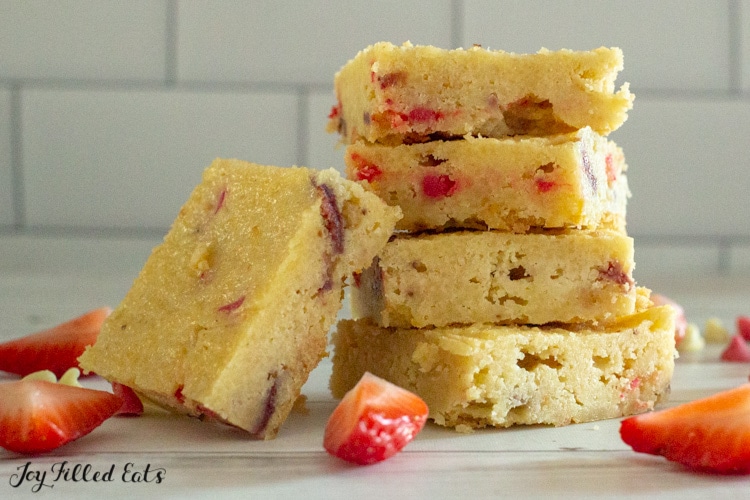stack of keto strawberry blondies with one on its side