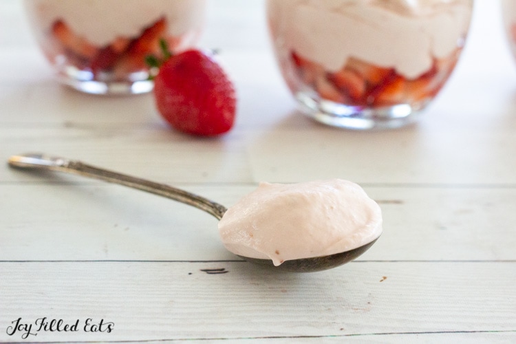 keto strawberry mousse on a spoon.