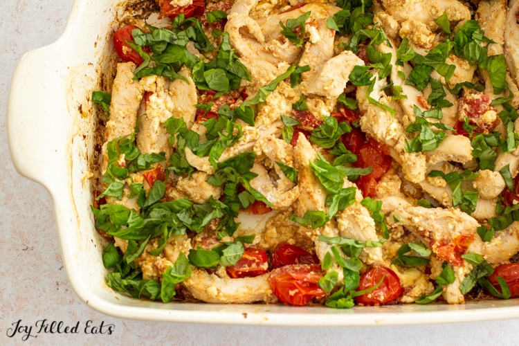 casserole dish with baked feta chicken