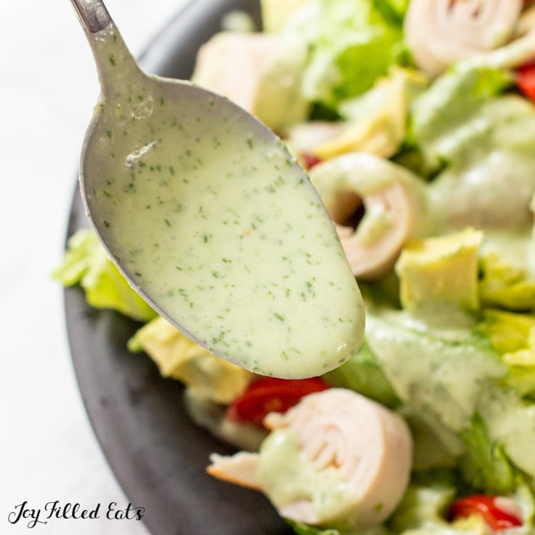 spoon with dairy free dressing