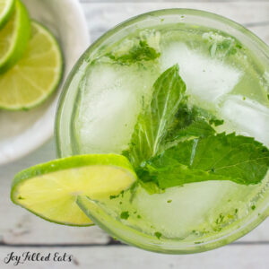 close up of keto mojito overhead with lime and mint