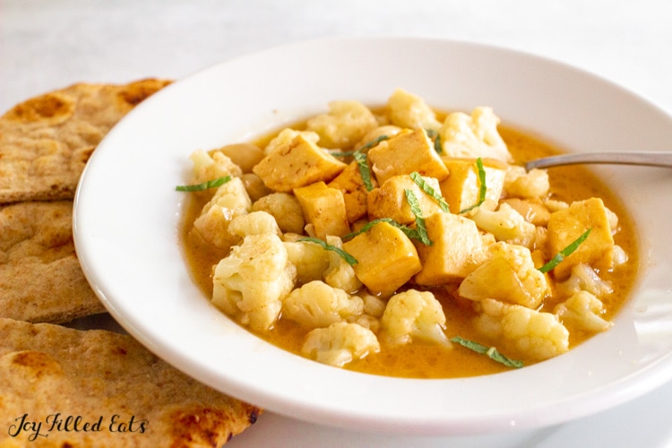 instant pot paneer curry in a wide rimmed bowl