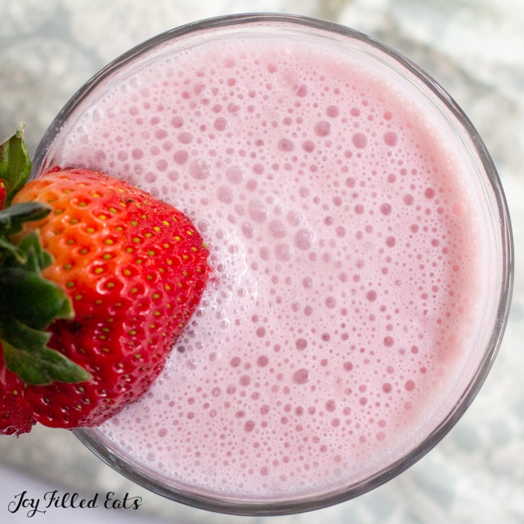close up of keto strawberry smoothie in glass