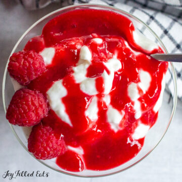 close up of keto raspberry sauce on yogurt