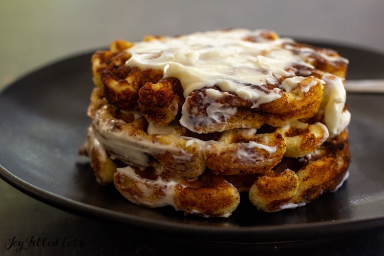 stack of cinnamon roll waffles on a plate