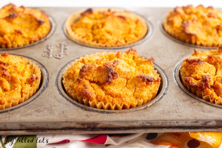 baked keto pumpkin muffins in pan close up