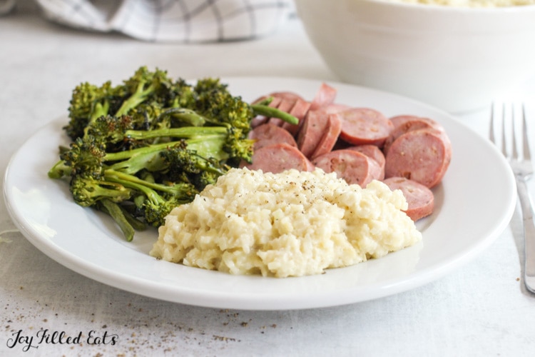 plate with low carb risotto, meat, and vegetables