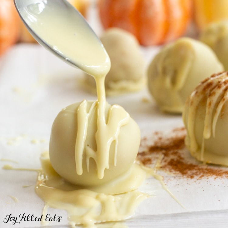 white chocolate being drizzled as a garnish