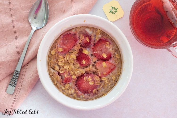 bowl of single serve baked oatmeal topped with strawberries
