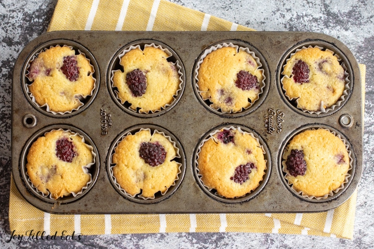 baked keto blackberry muffins in tin