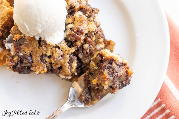 bite of low carb chocolate pecan pie on a fork