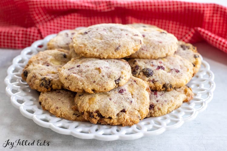 white chocolate and raspberry cookies on a plate