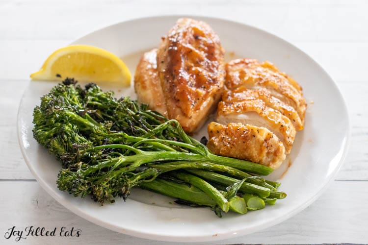 plate of baby broccoli and chicken