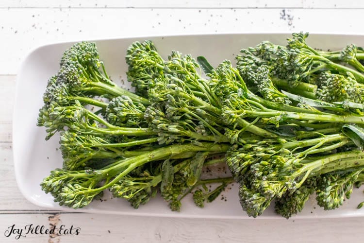 raw baby broccoli with oil salt and pepper