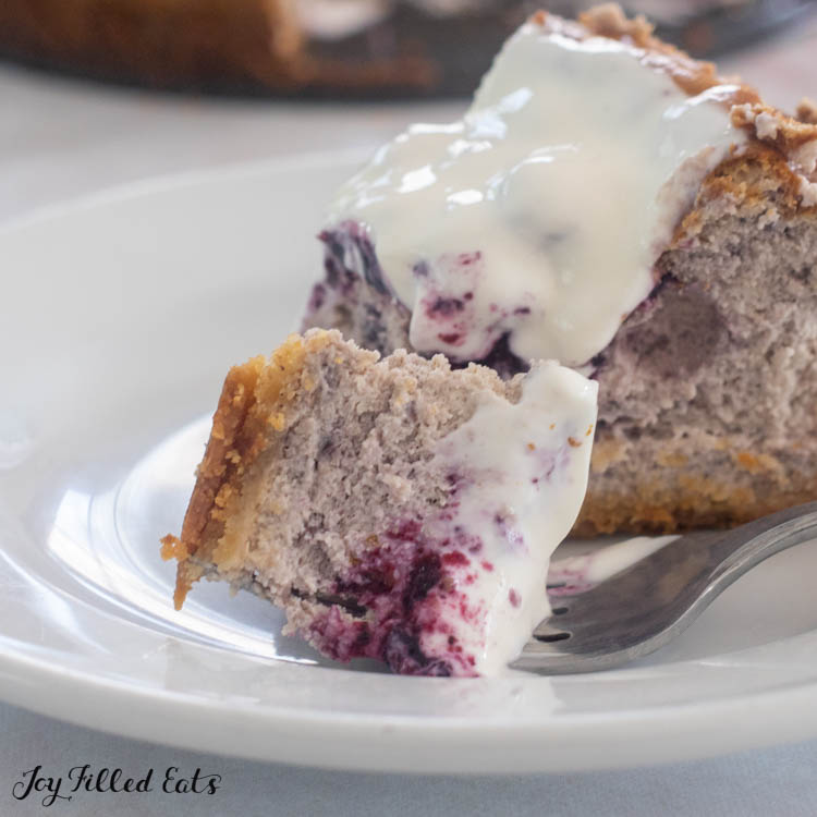 bite of keto berry cheesecake on a fork
