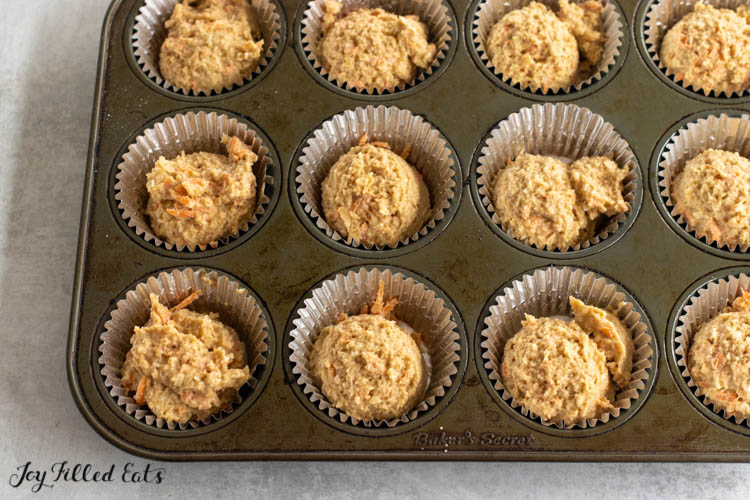 batter in foil lined muffin tin