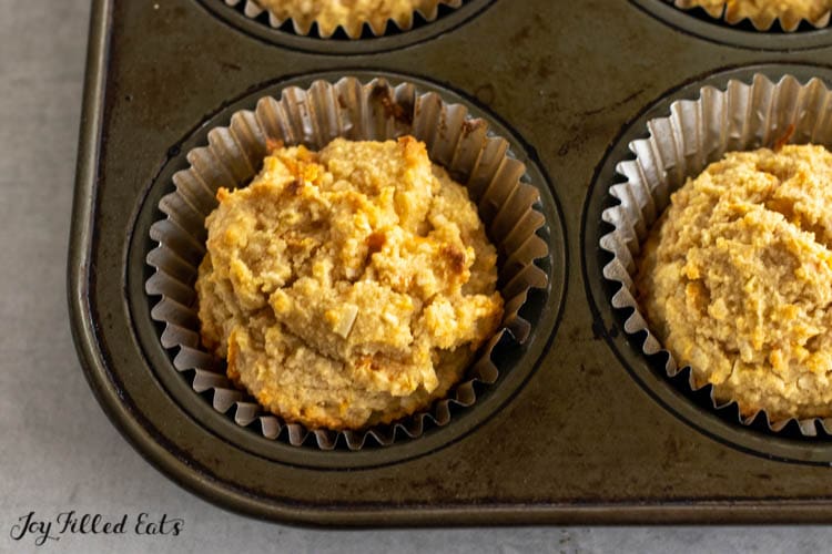 baked keto carrot cake muffins in muffin tin