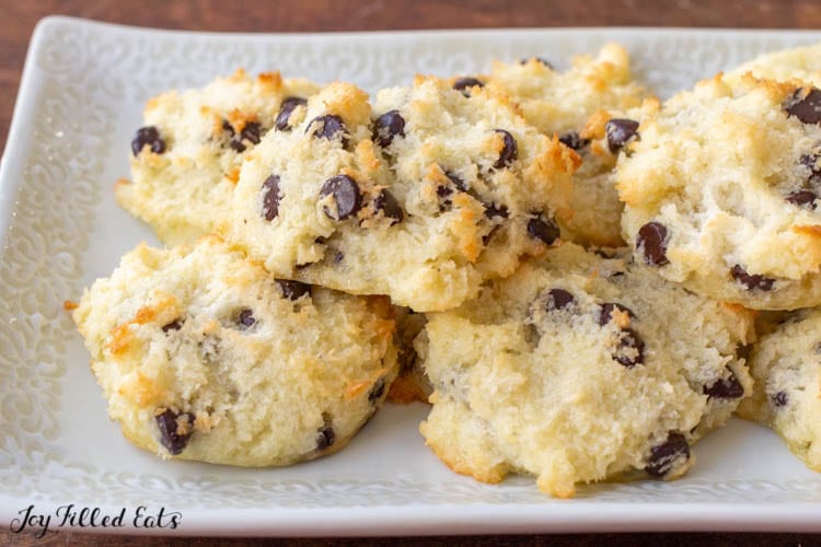 pile of chocolate chip coconut macaroons on a white plate