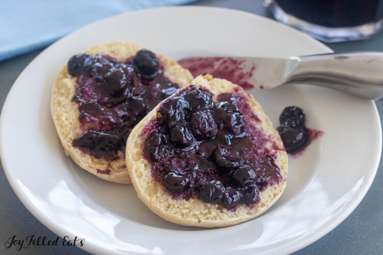 halved english muffin with sugar free blueberry jam